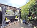 Gepflegte Doppelhaushälfte mit Charme im Zentrum von Markt Schwaben - Terrasse mit Garten