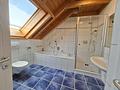 Familienglück mit Charme - Gepflegtes Einfamilienhaus mit großzügigem Garten und Garage - Badezimmer OG