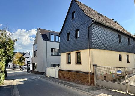 Seltenes Schmuckstück mit Charme und Geschichte – zentrales Ein- oder Zweifamilienhaus mit Garten - Seitenansicht