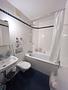 Attraktive Kapitalanlage - saniertes Apartment mit zuverlässiger Mieterin - Badezimmer mit Wanne