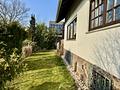 Freistehendes Einfamilienhaus
mit Garten, Kamin und Terrasse
- viel Platz für die Familie - - Seitlicher Garten