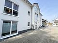 Moderne & hochwertige 3-Zimmer-Wohnung inkl. Garagen-Stellplatz - Hausansicht