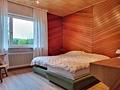 Attraktiver Bungalow in bevorzugter Wohnlage mit traumhaftem Garten - Schlafzimmer mit Blick in den Garten