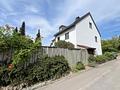 Attraktives Reiheneckhaus mit großem Garten in Perlach - Straßenansicht