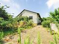Charmantes Einfamilienhaus mit großem Garten in familienfreundlicher Lage von Riedstadt/Wolfskehlen - Frontansicht
