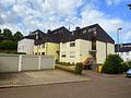 Dreifamilienhaus mit 3 Garagen – ideal für Eigennutzer & Kapitalanleger - Außenansicht Süd