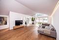 Winkelhaus-Bungalow in Memmelsdorf - Wohnanlage Seehofblick - Wohnzimmer - KI generiert