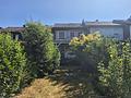 Einziehen statt sanieren – gepflegtes Reihenmittelhaus mit schönem Garten - Rückansicht