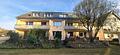 Modernisiertes Mehrfamilienhaus mit 6 Wohnungen & Garagen in Top-Lage Westend/Neu-Isenburg - Hausansicht hinten 