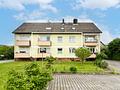 Charmante 2-Zimmerwohnung mit Gartenblick und praktischem Grundriss in Groß-Zimmern - Rückansicht