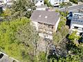 Großzügiges Wohnen in Hanglage – Einfamilienhaus mit geräumiger Einliegerwohnung und attraktiver Rendite - Hausrückseite
