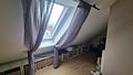 Attraktives Renditeobjekt: Gepflegtes Mehrfamilienhaus in begehrter Lage von Nauheim - DG Zimmer Bild 1