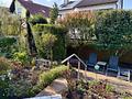 Stilvolles Einfamilienhaus mit Split-Level-Charakter,
Terrasse, Garten & Garage in begehrter Lage - Garten