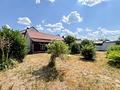 Ein Zuhause mit vielen Möglichkeiten – großzügiges Wohnhaus mit Garten und zwei Garagen - Garten_Werkstatt