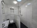 Modernisierte 4-Zimmer-Wohnung mit Einbauküche - Badezimmer