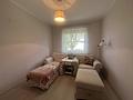 Familienfreundliche 4-Zimmer-Eigentumswohnung mit Terrasse, Gartenanteil, Garage und Keller - Wohnzimmer geteilt
