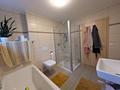 Sonnige Terrassenwohnung mit Gartenanteil in Heidenheim - Badezimmer
